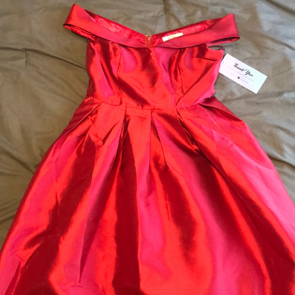 Very elegant off the shoulder red dress.